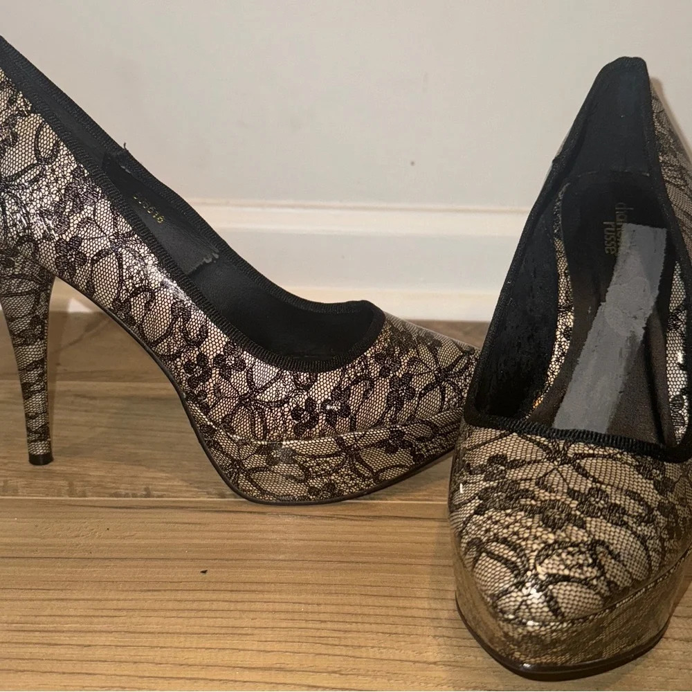 Platform heels. Charlotte Russe. Color is beige with lots of black lace size 10